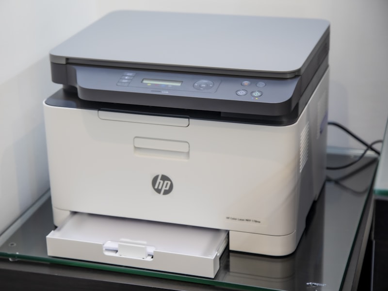 A white all-in-one office printer.